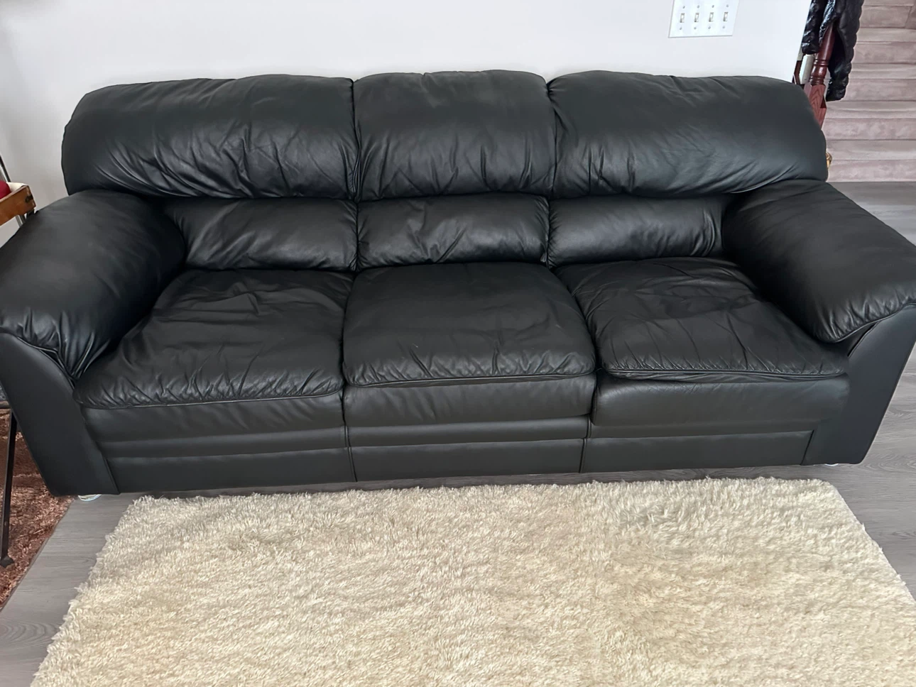 Black Leather Three-Seater Sofa