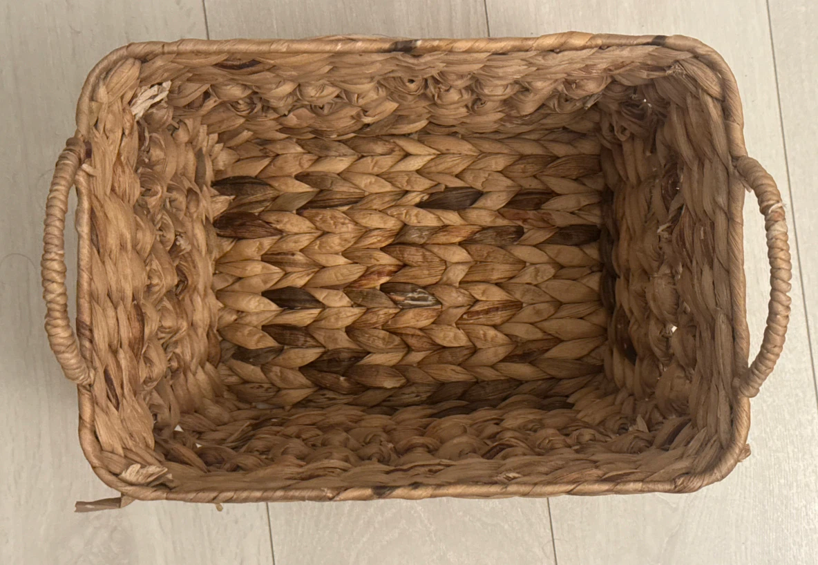 Medium sized vintage woven braided wicker basket