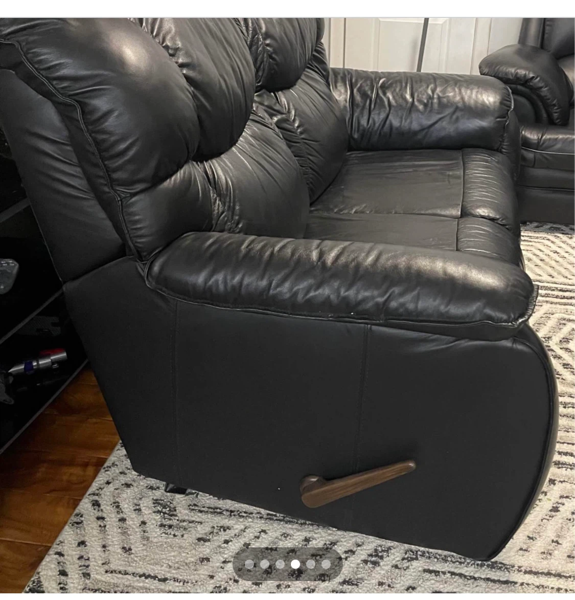 Reclining black loveseat