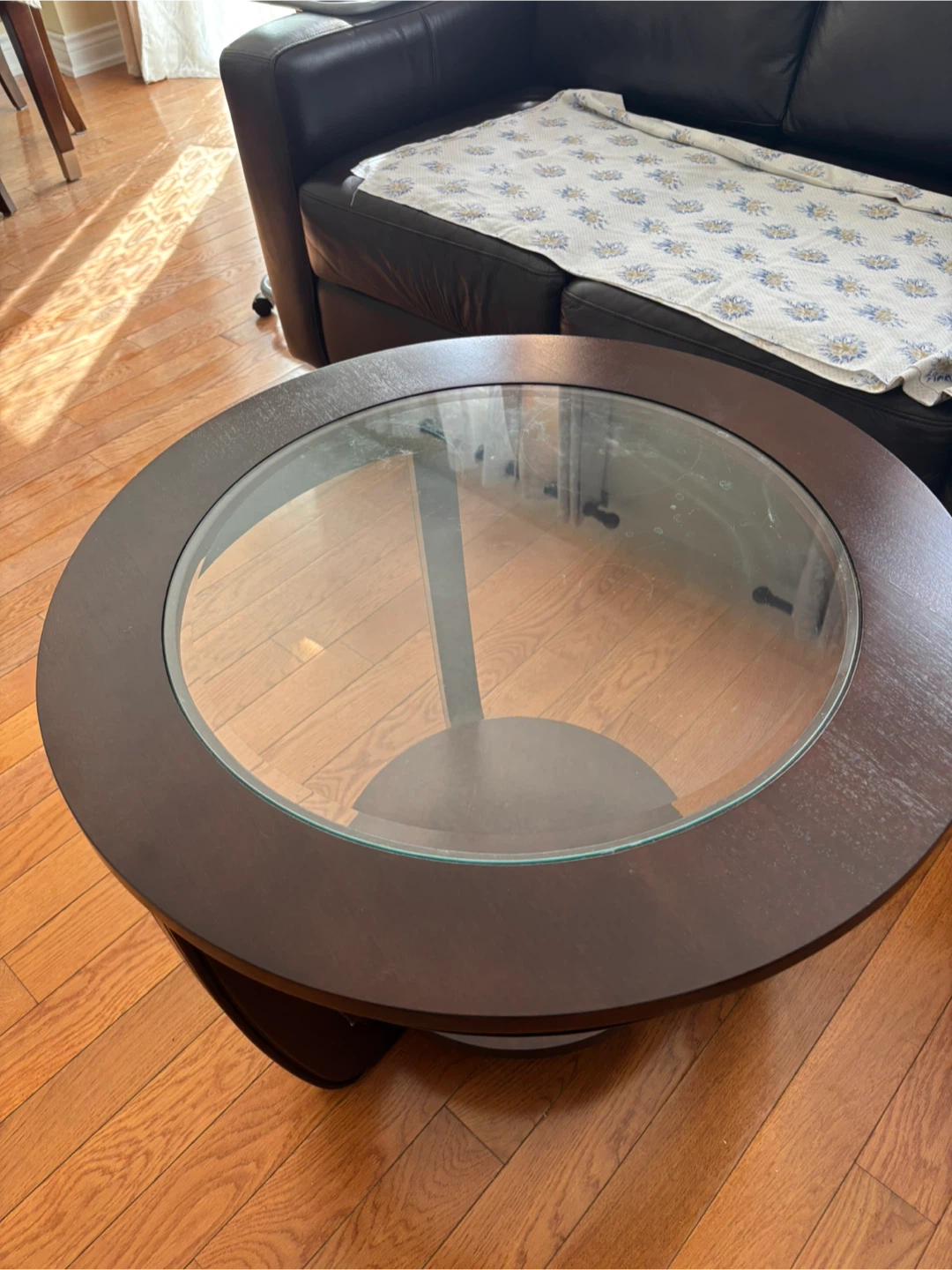 Circular glass coffee table