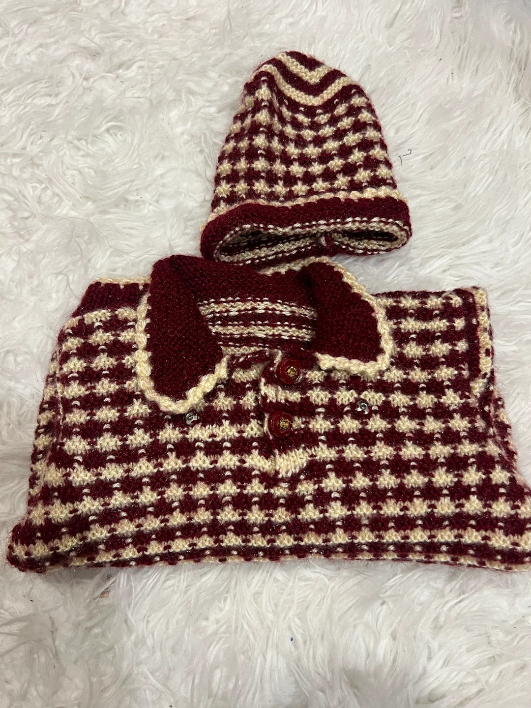 Hand-knitted baby sweater and toque set