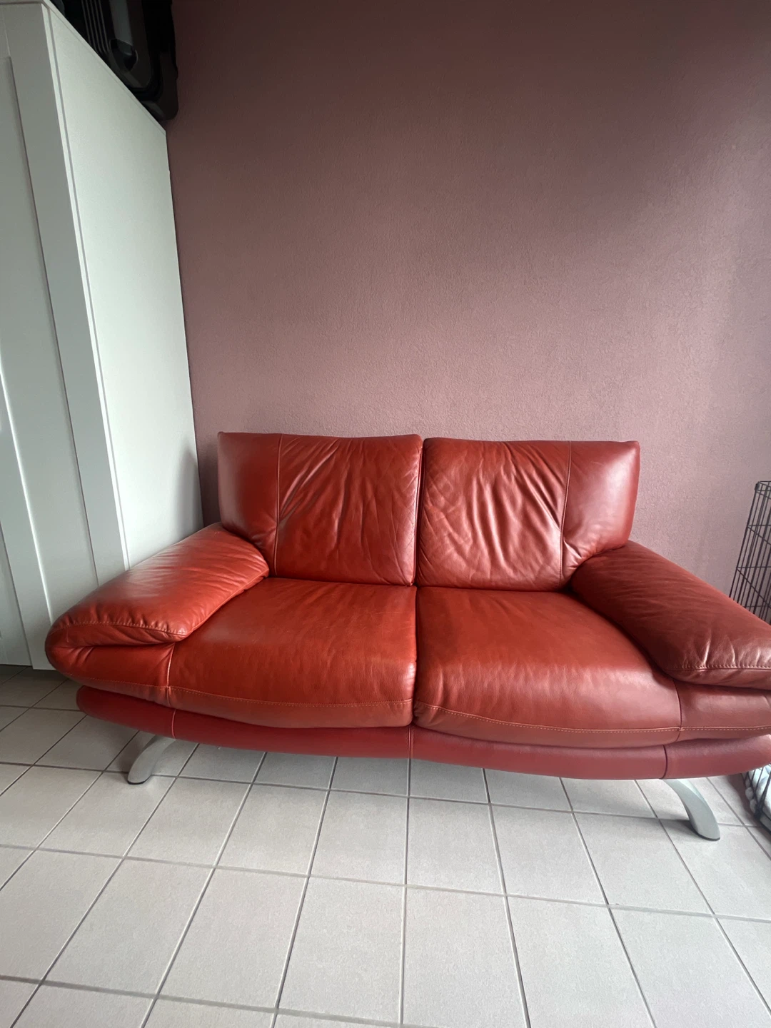 Red Leather Two-Seater Sofa