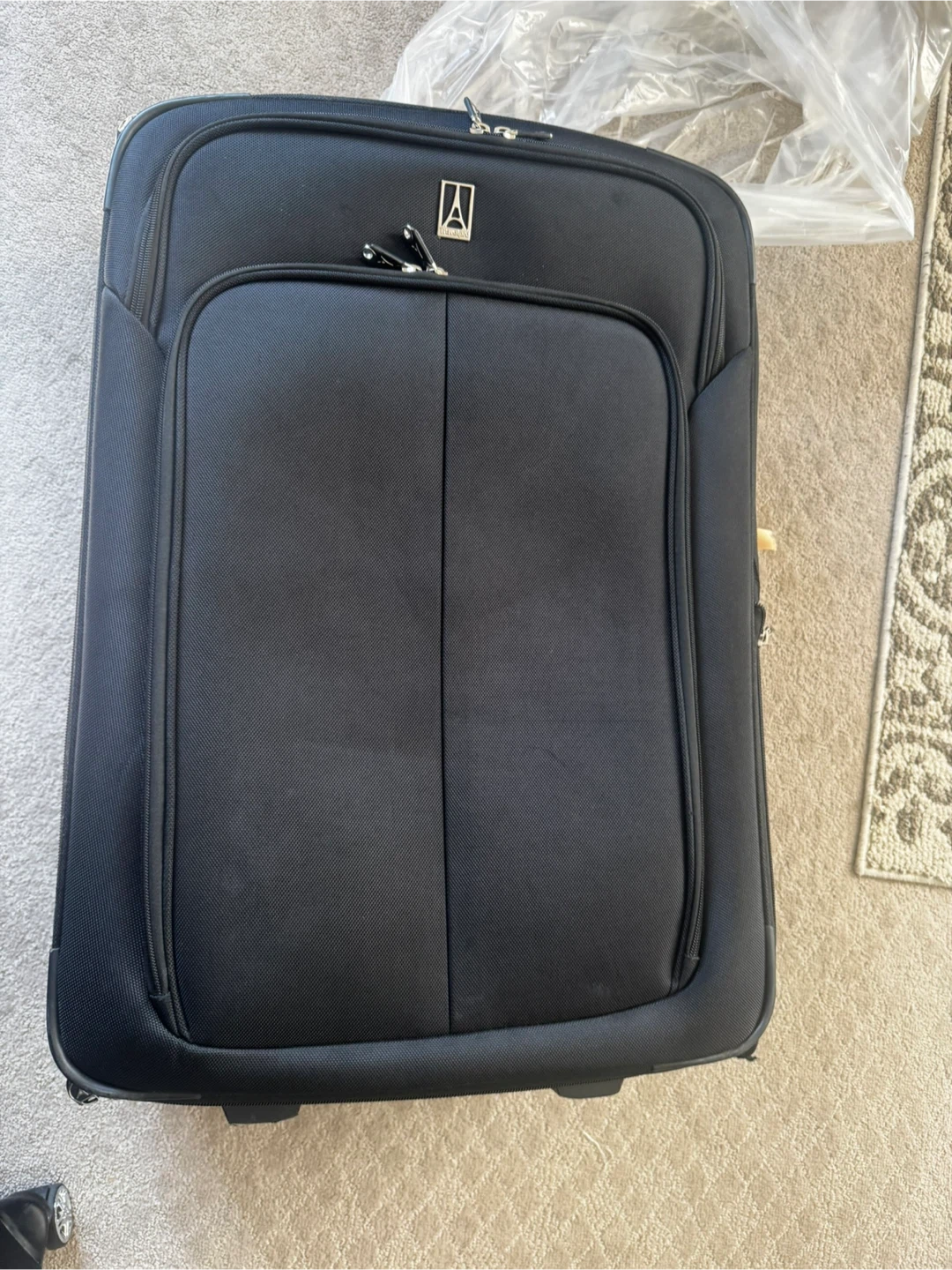 Travelpro Black Rolling Luggage