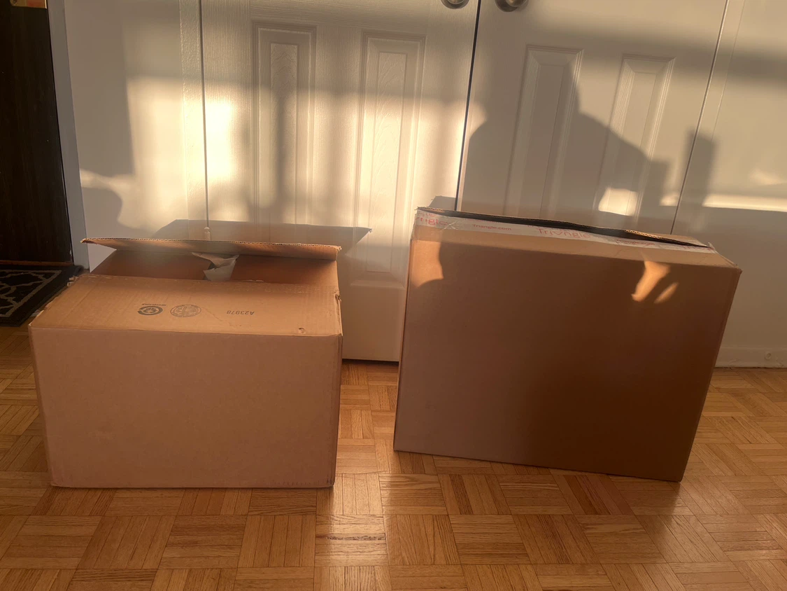 Two Assorted Cardboard Boxes