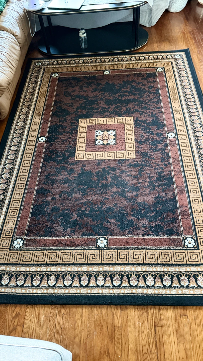 Large black and brown rectangular area rug