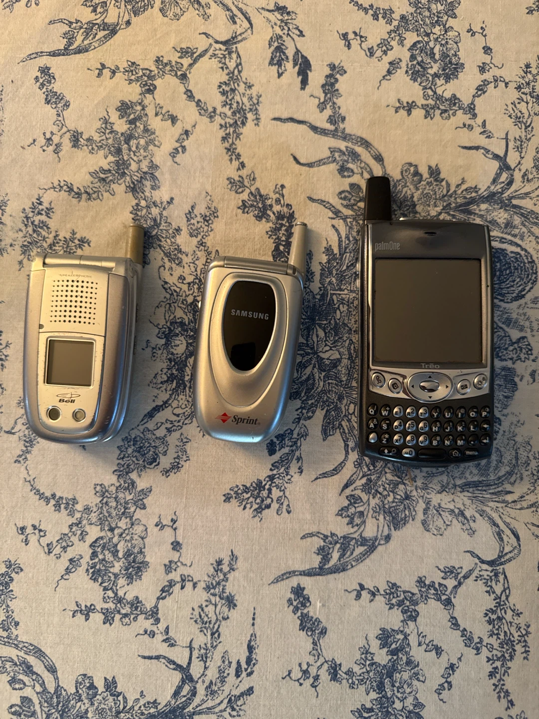 Three vintage mobile phones
