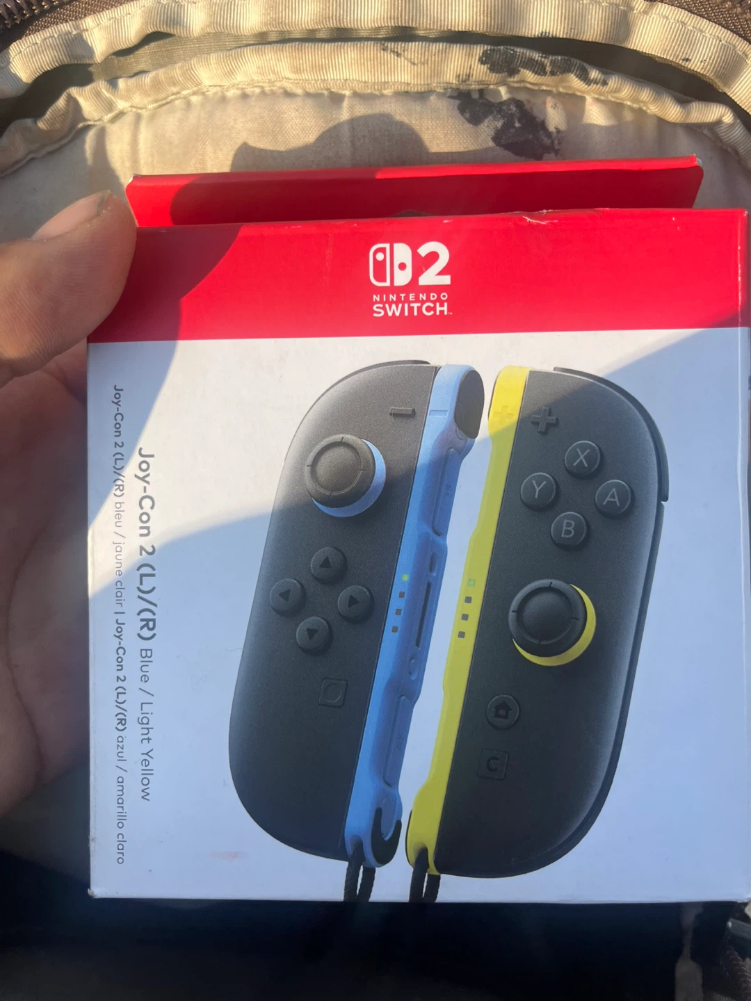 Nintendo Switch Joy-Con Blue and Light Yellow Controllers