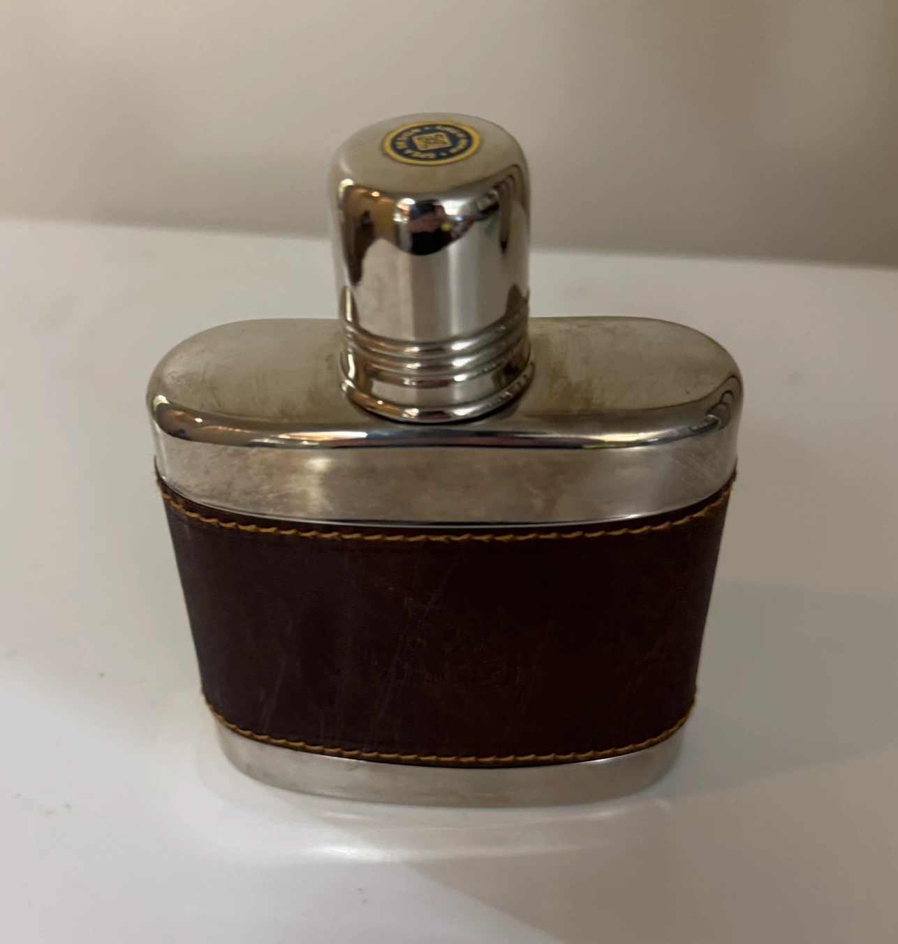 Leather-wrapped stainless steel flask