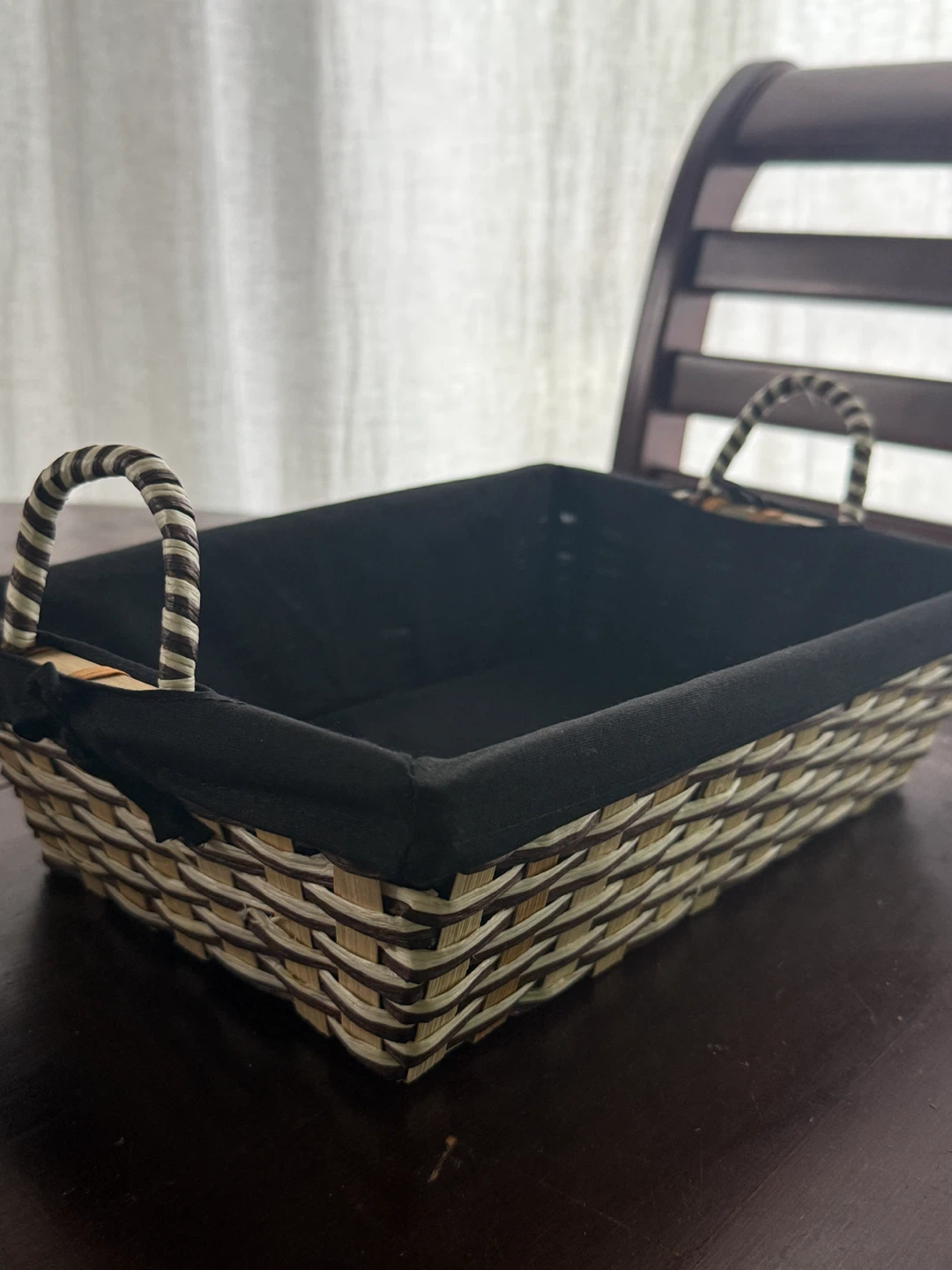 Woven storage basket with black liner