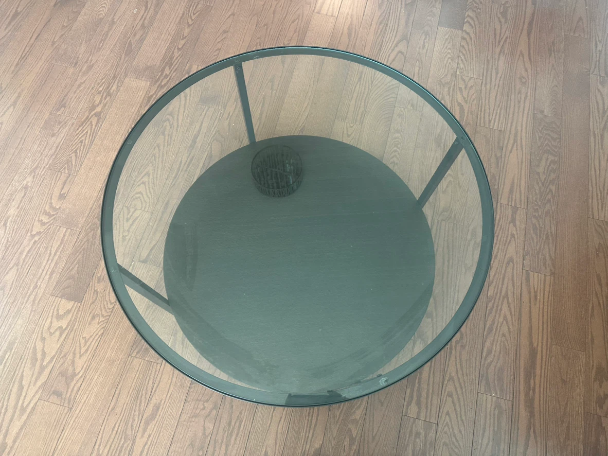 Round Glass Coffee Table with Black Base