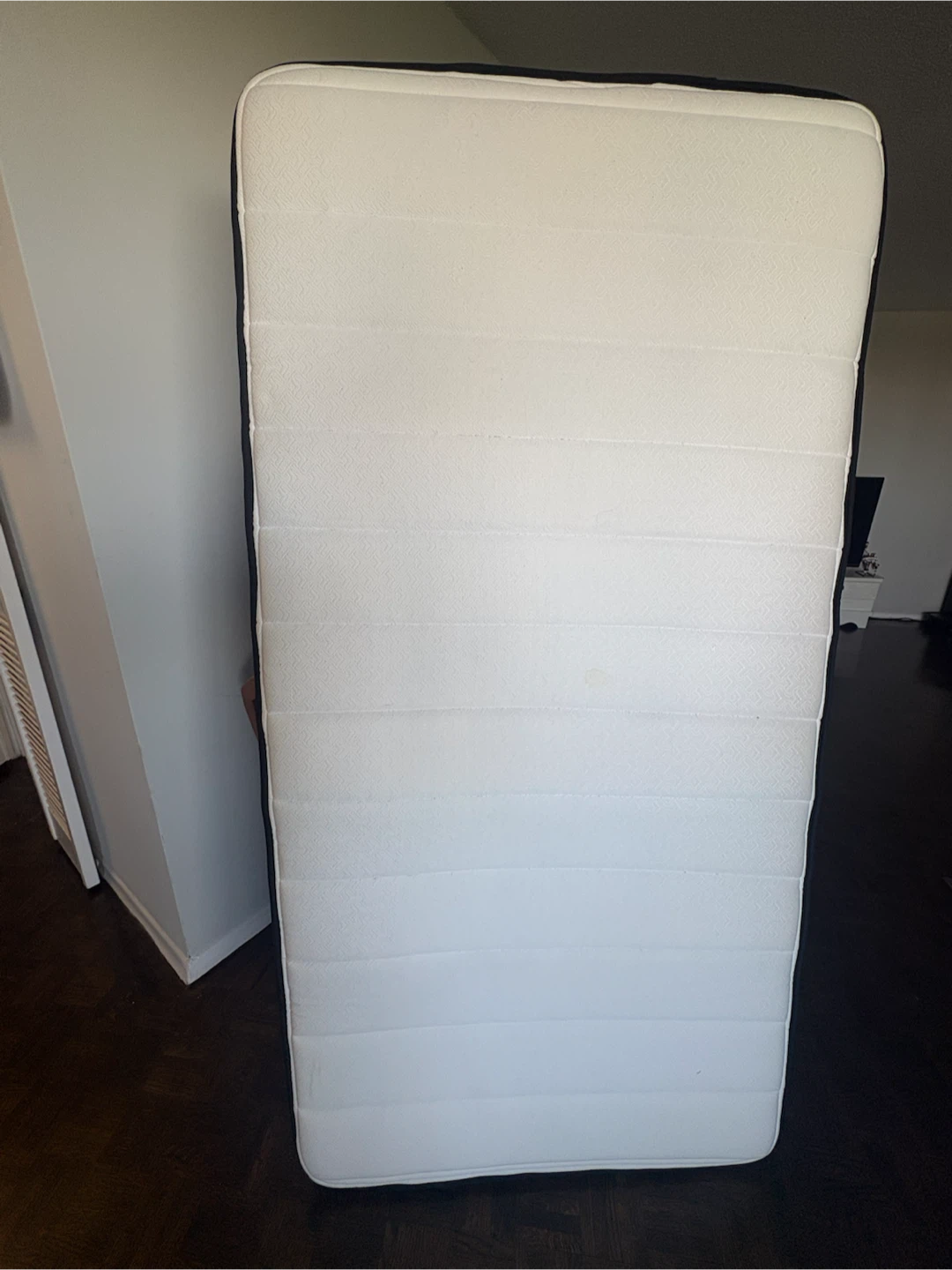 Twin size mattress with protective cover
