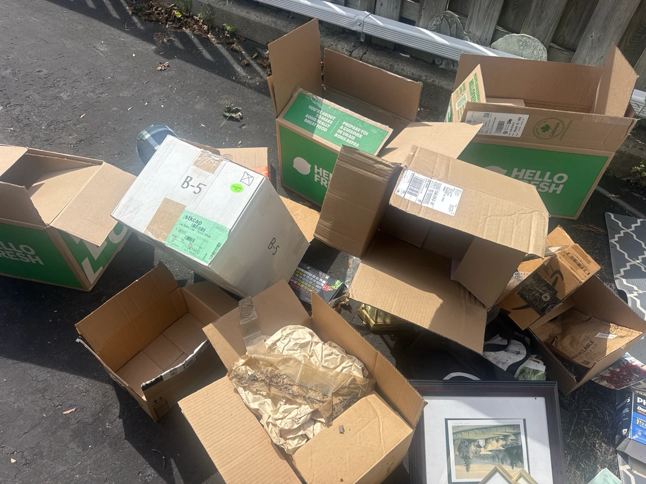 Assorted cardboard moving boxes