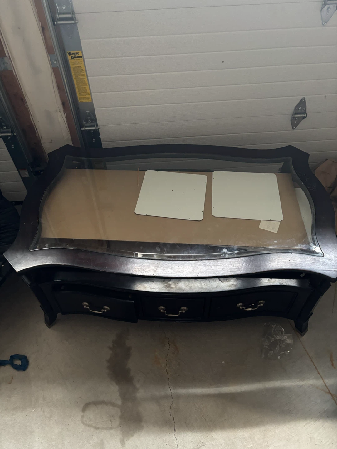Dark wood coffee table with glass top