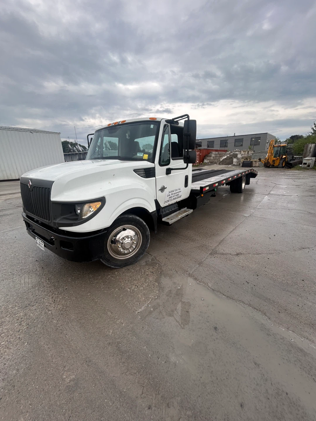 International Flatbed Tow Truck