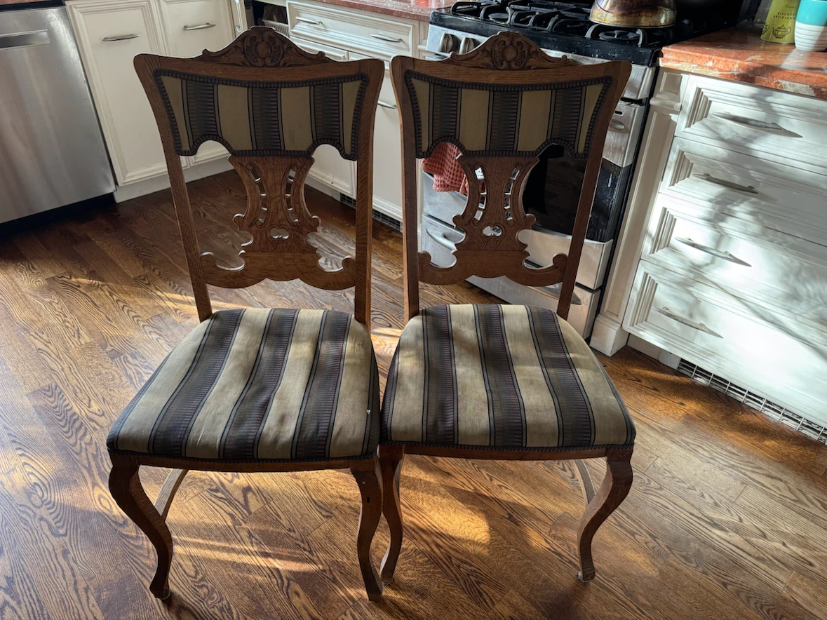 Two oak dining room chairs
