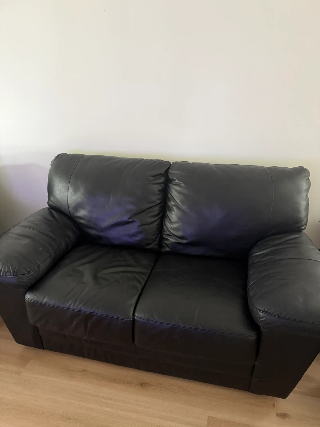 Black Leather Two-Seater Sofa