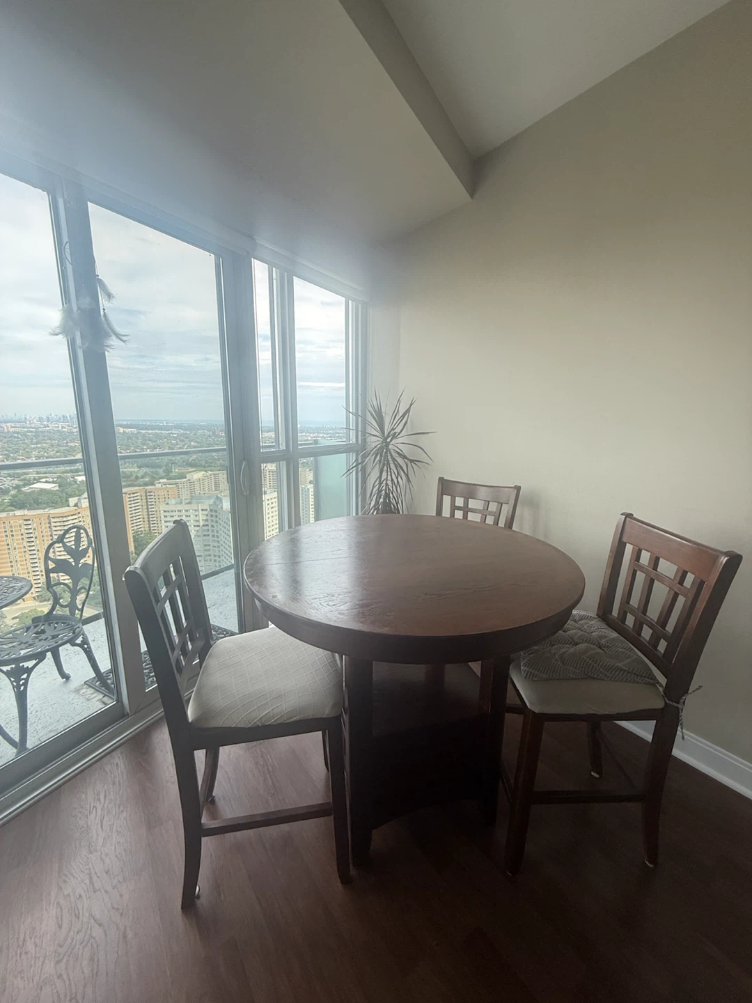 Round Malaysian Wooden Dining Table with Three Chairs