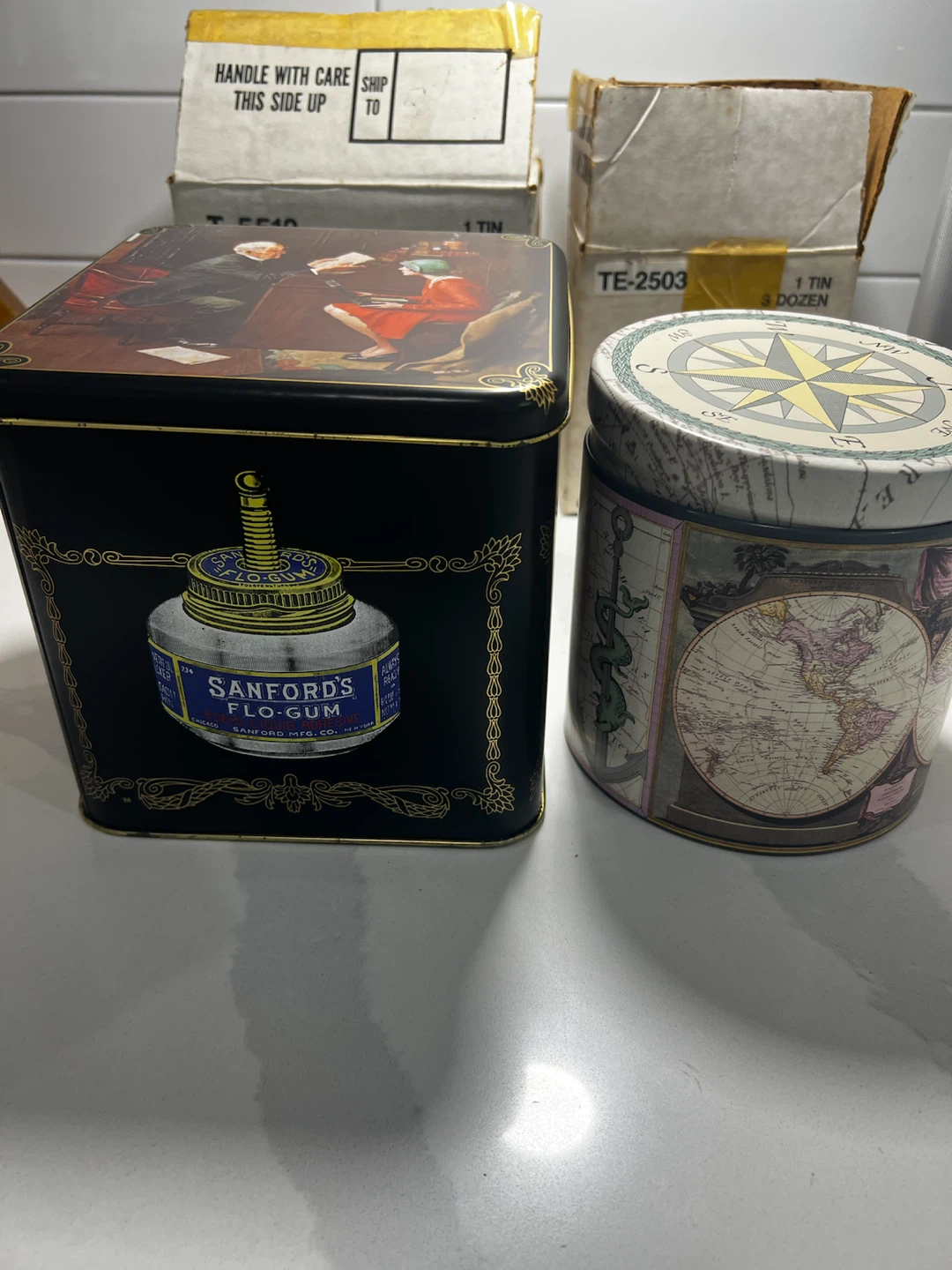 Two Sanford Vintage Decorative Tins