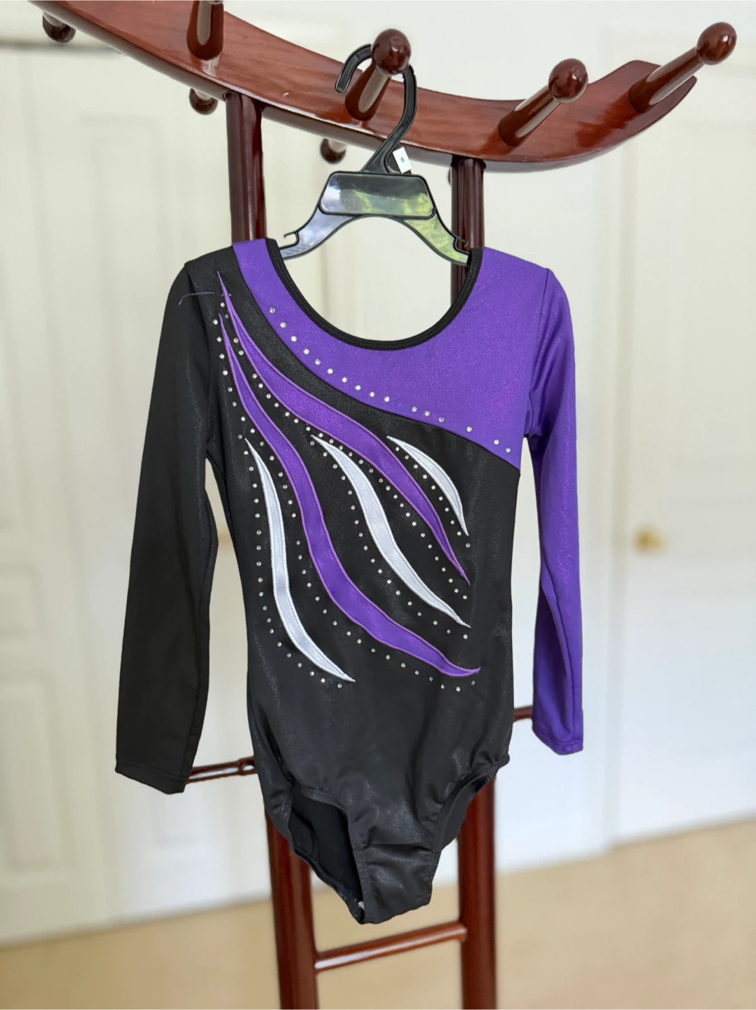 Two long-sleeve gymnastics leotards