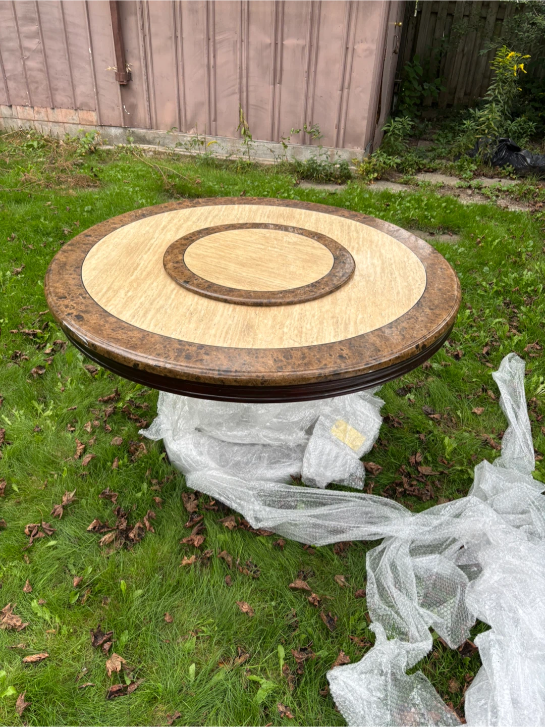 Round marble top dining table
