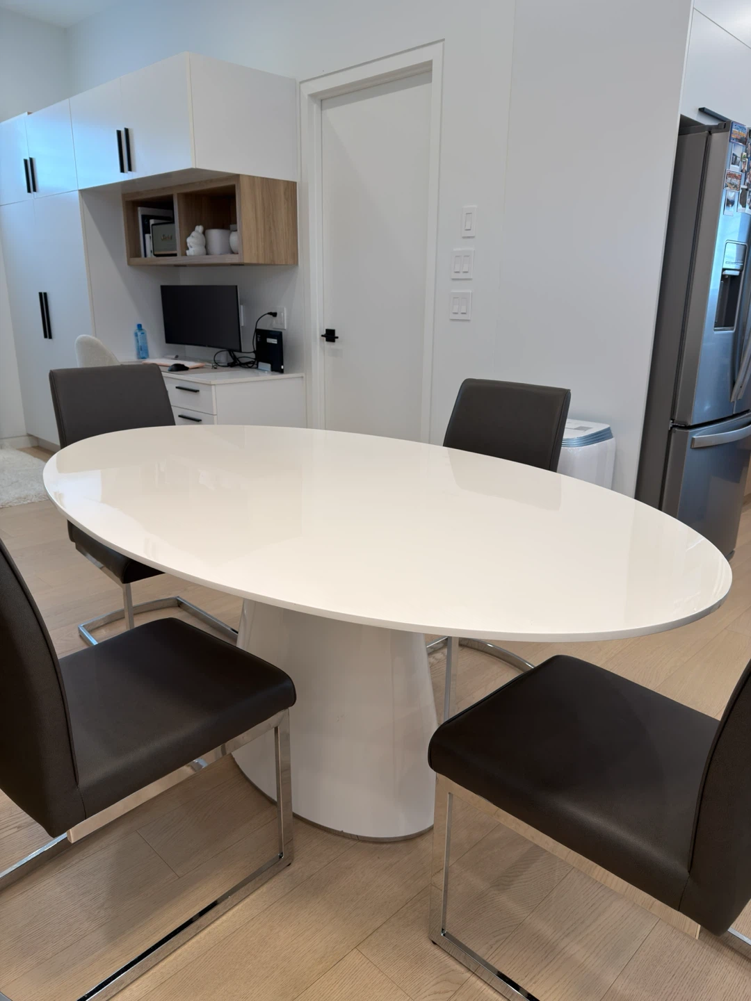 White Oval Dining Table with 4 Chairs
