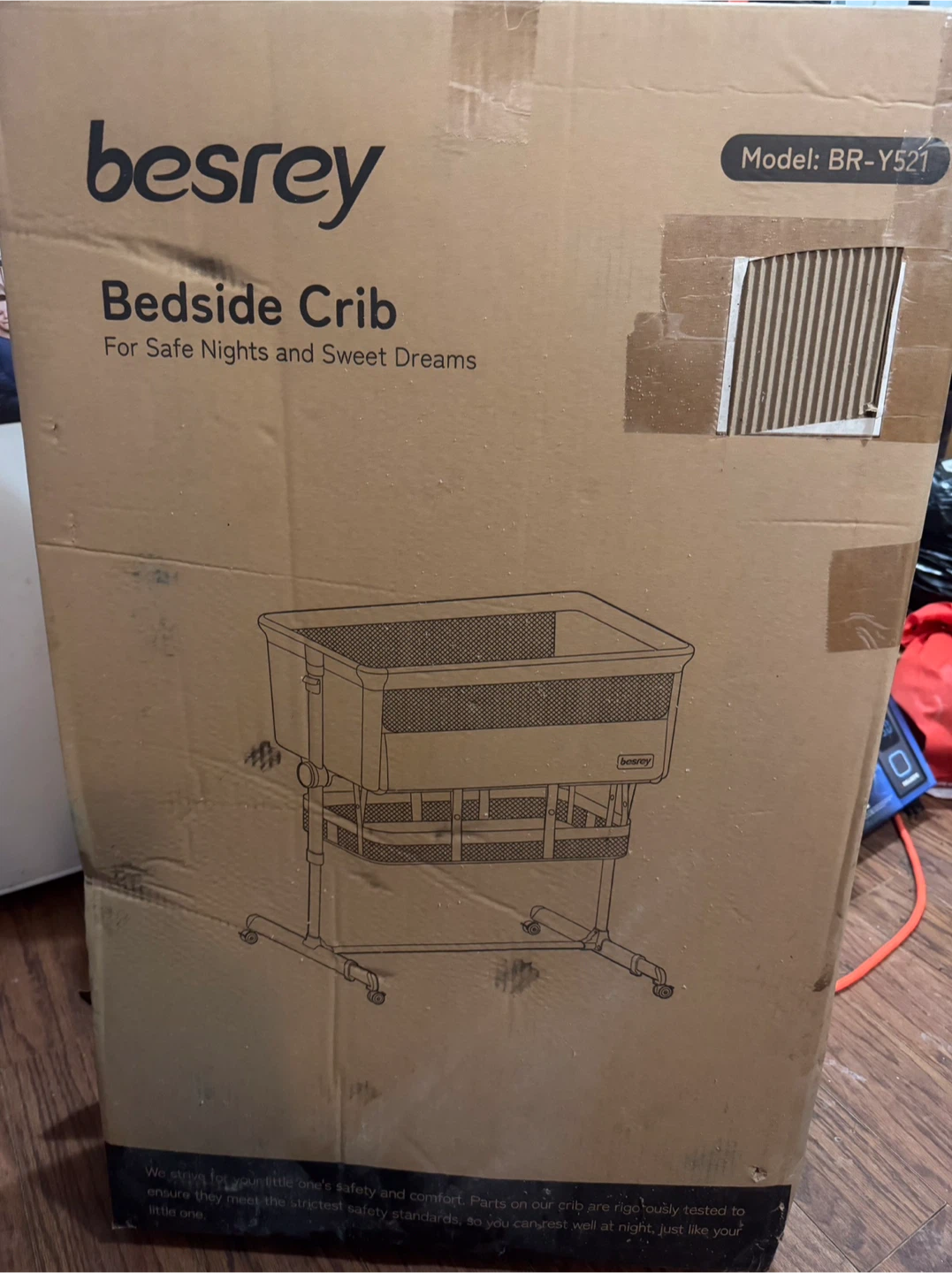 Besrey Bedside Crib and Infantino Baby Carrier