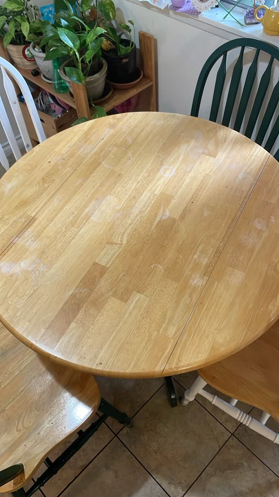 Round wooden dining table