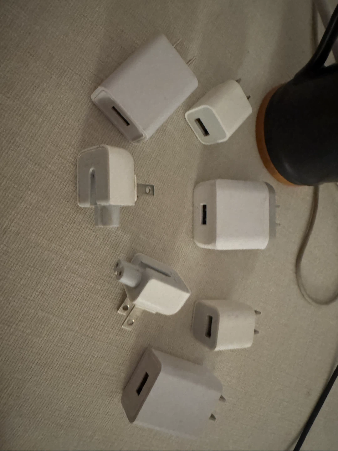 Assorted White Wall Power Adapters and Plugs