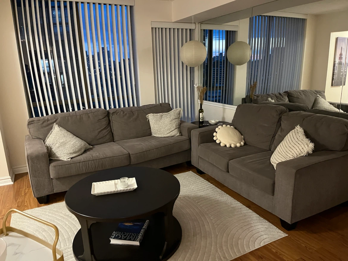 Dark grey sofa set and round coffee table