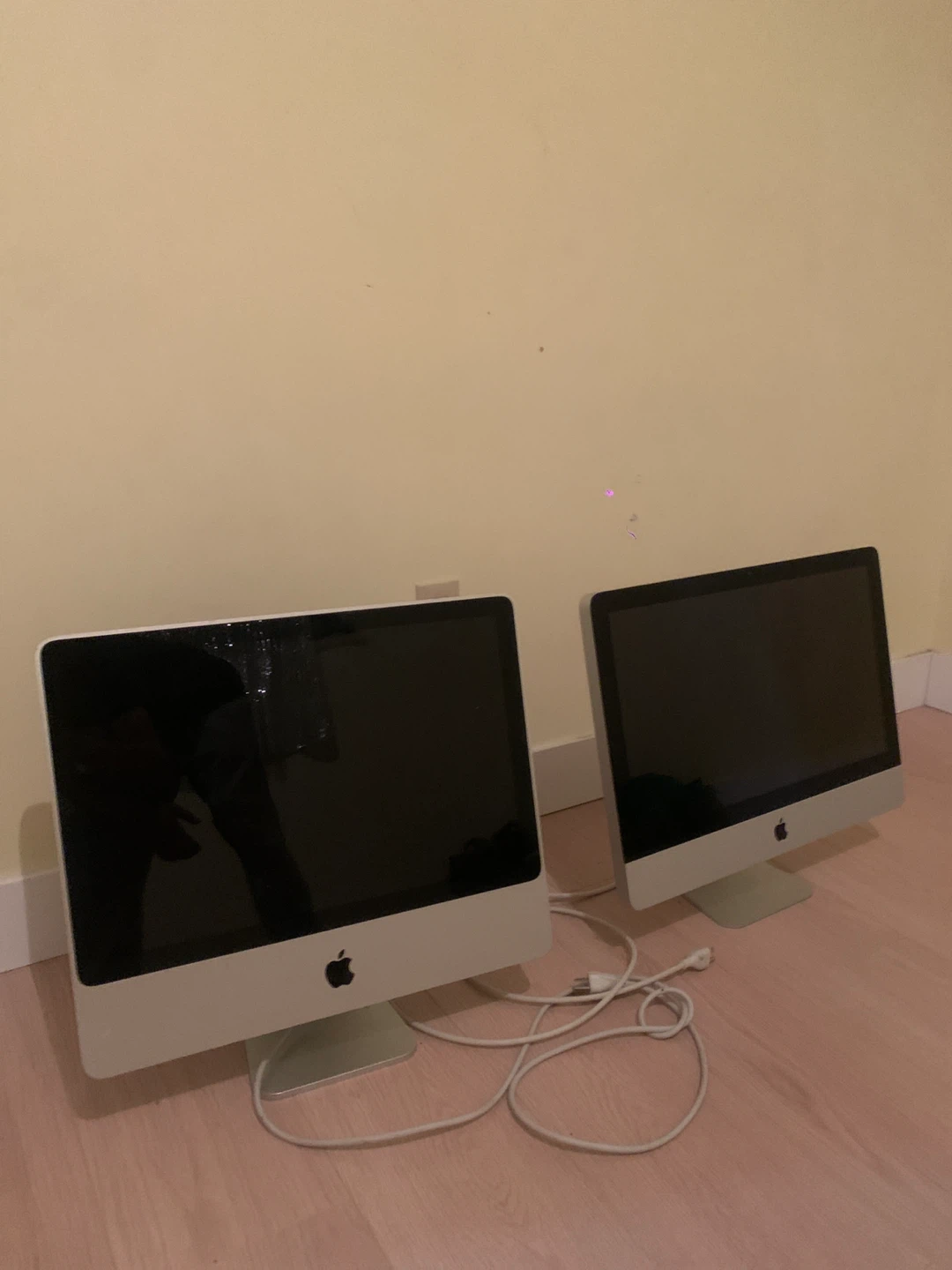 Two Apple iMac Desktop Computers