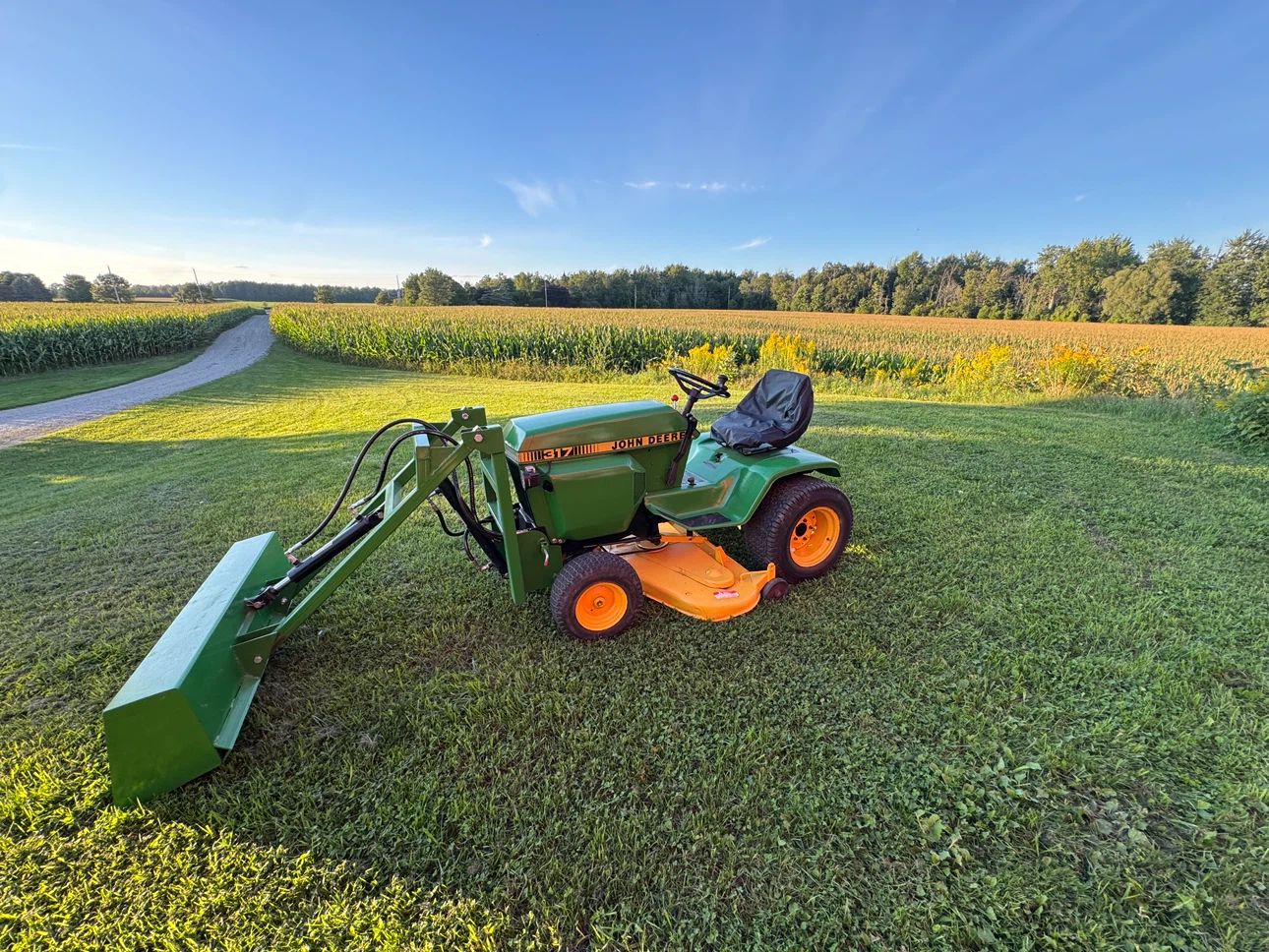 John Deer 317 Tractor with loader and deck - photo 2
