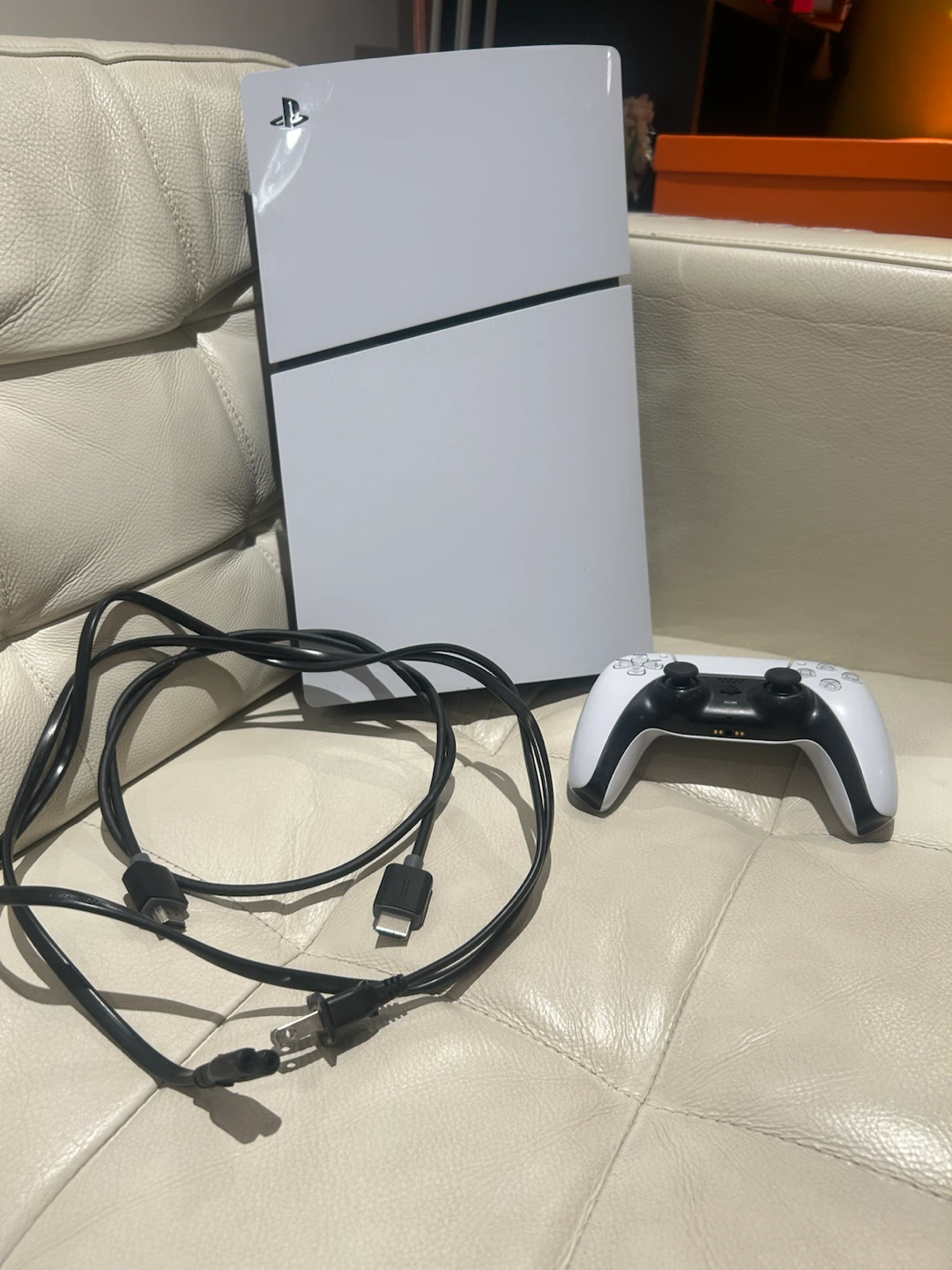 Ps5 with a controller and games