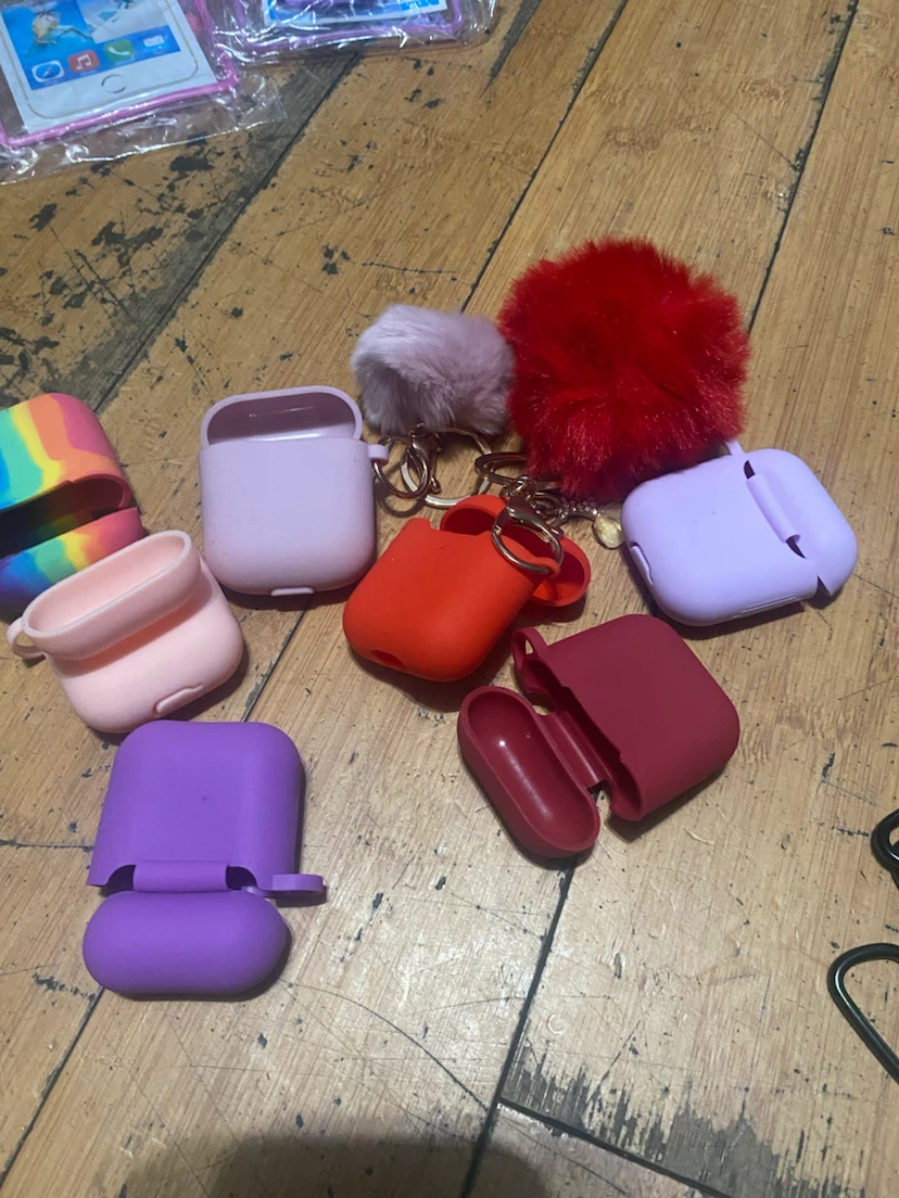 Assorted AirPod cases with hanging clips - photo 2
