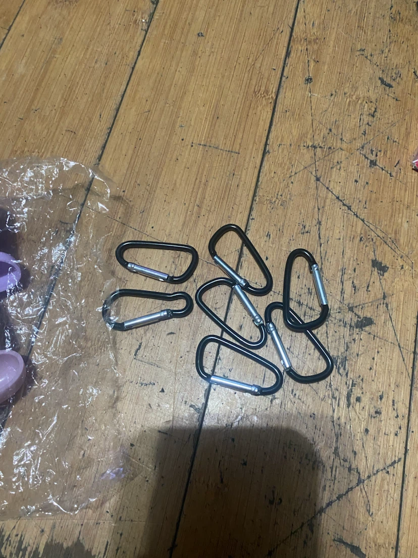 Assorted AirPod cases with hanging clips - photo 3