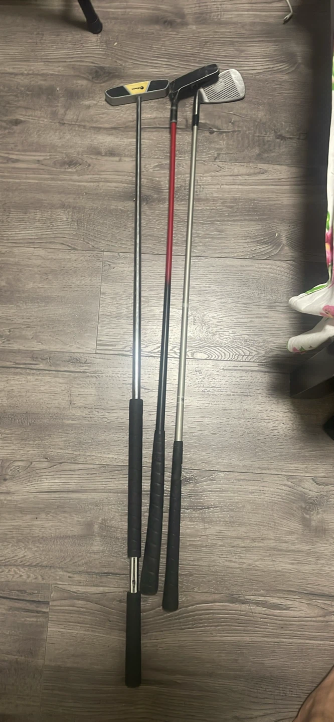 Set of Three Golf Clubs
