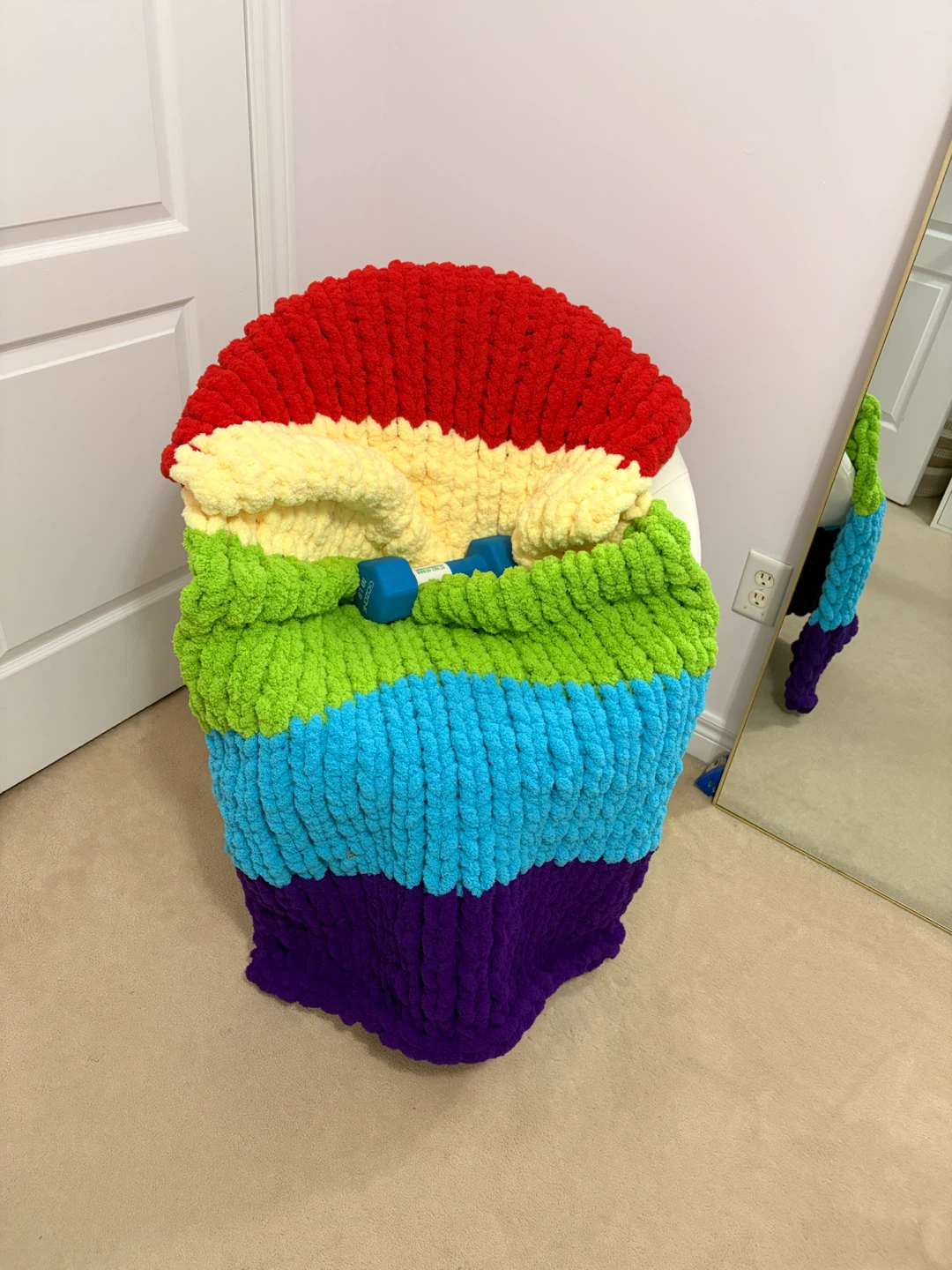 Hand-knitted chunky rainbow throw blanket