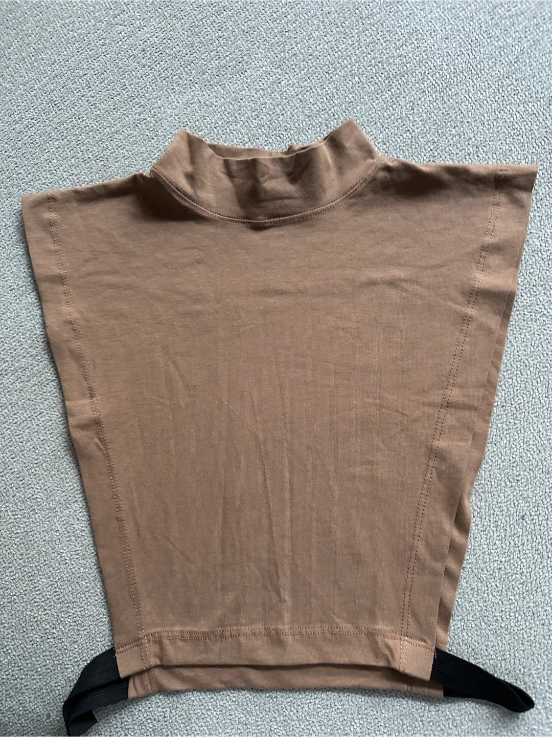 Brown sleeveless mock neck top