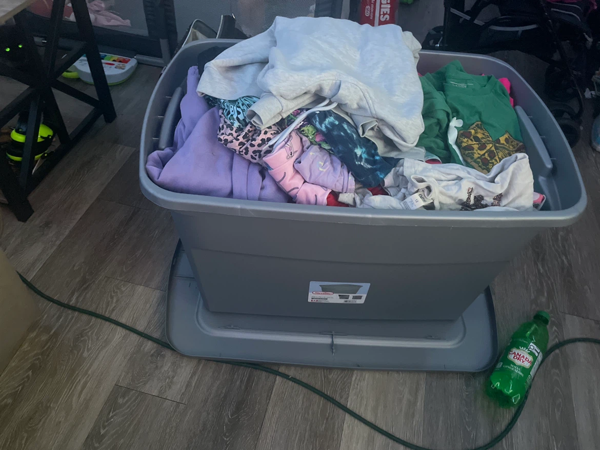 Sterilite Storage Tote with Children's Clothing - photo 2