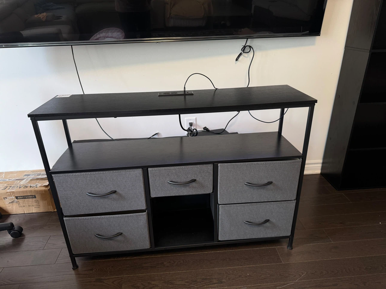 Black TV Stand with Built-in Outlets and LED Lighting