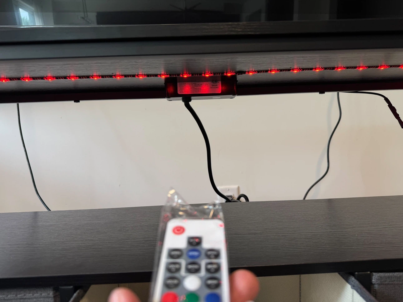Black TV Stand with Built-in Outlets and LED Lighting - photo 3