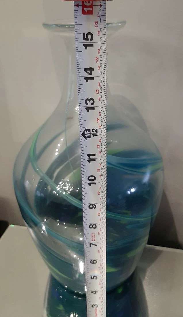 Blue decorative vase with floral arrangement - photo 3