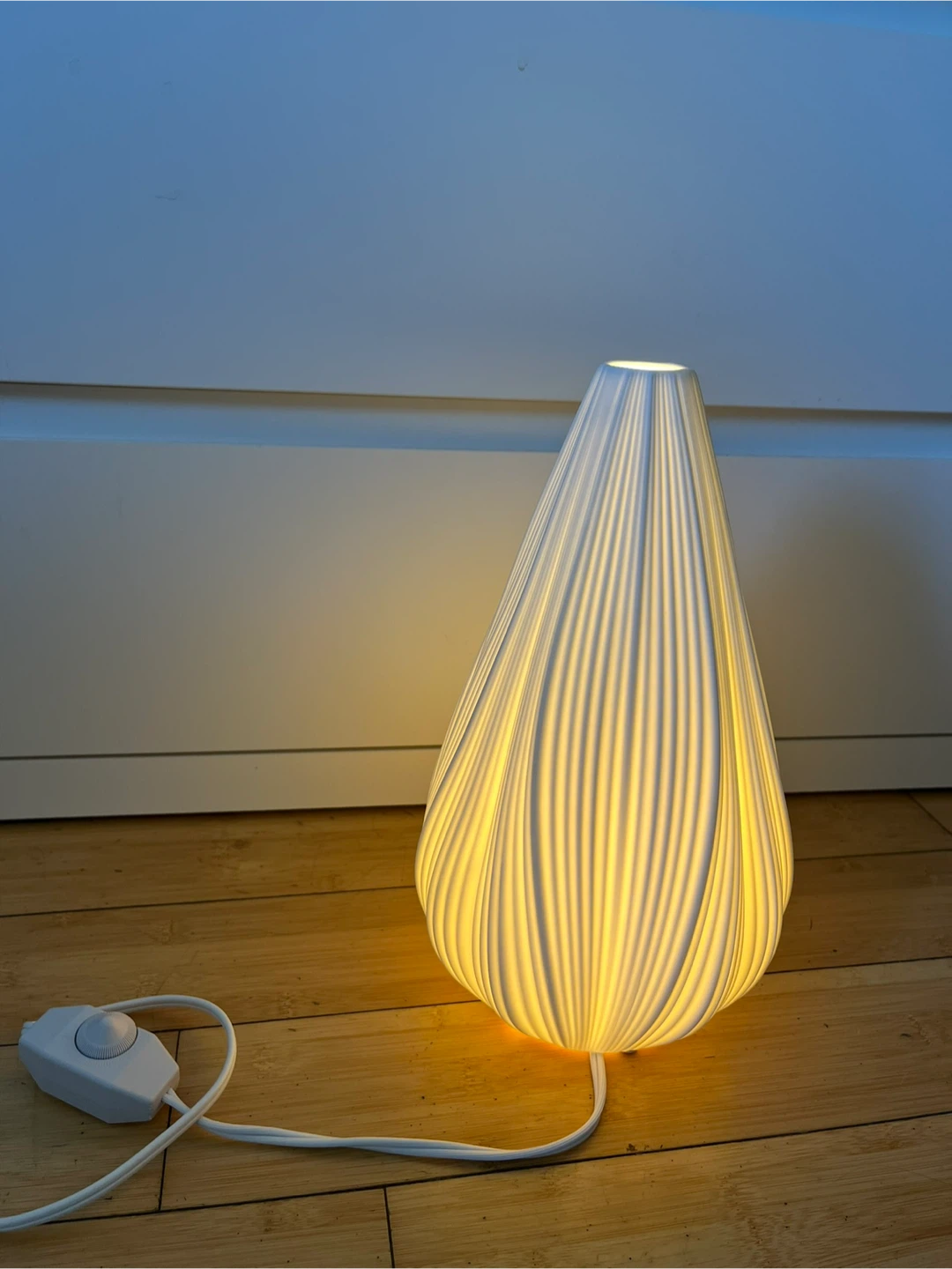 White pleated teardrop table lamp