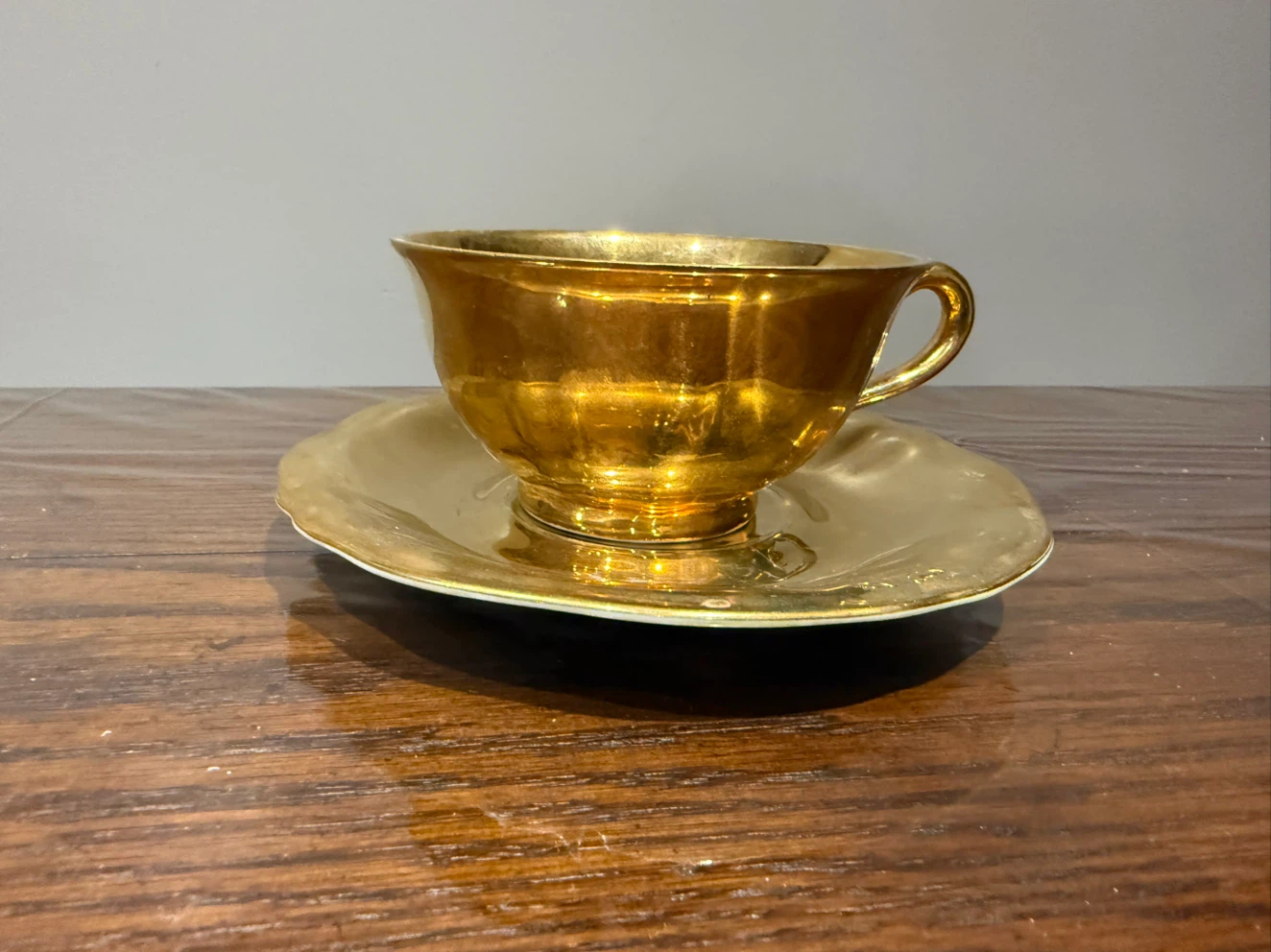 Gold Coloured Teacup and Saucer