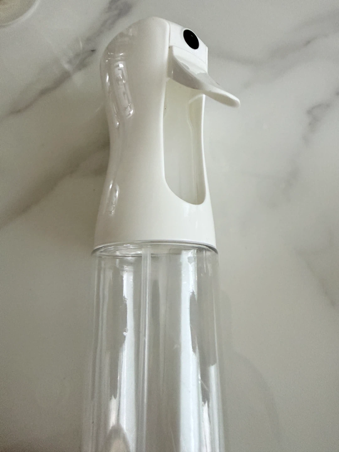 Clear and white fine mist spray bottle