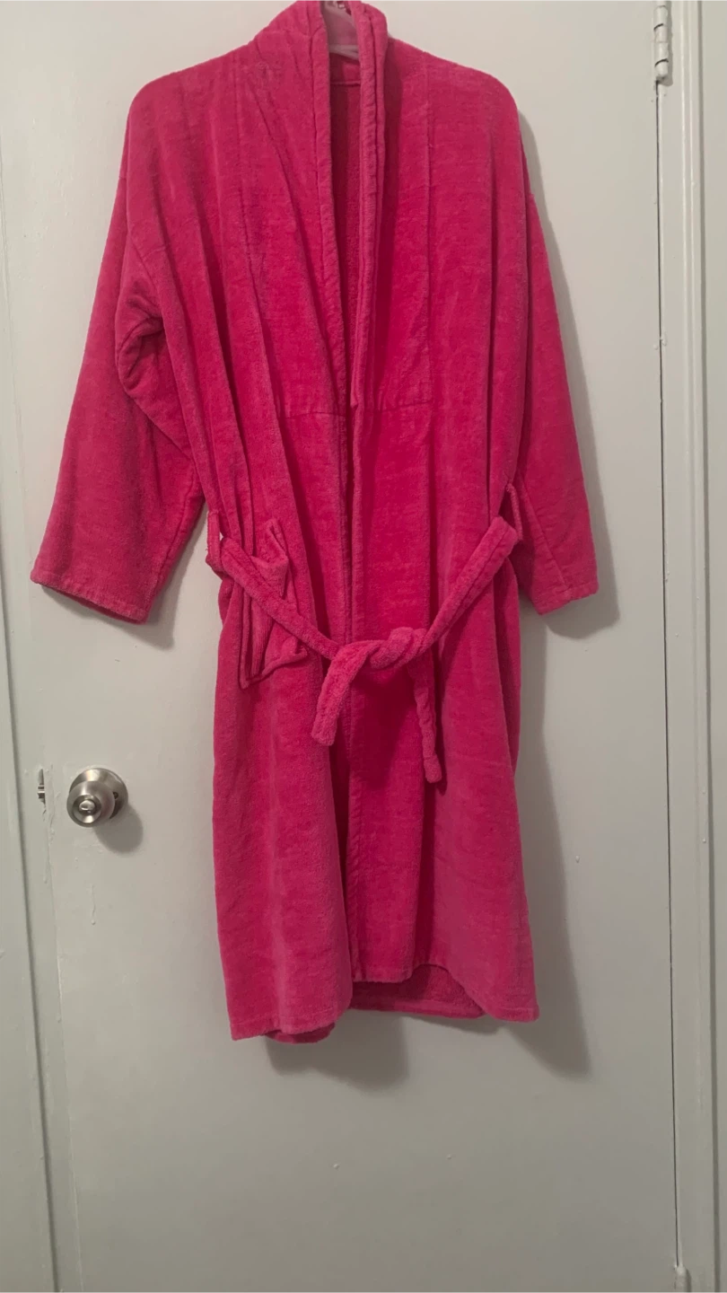 Bright pink terry cloth bathrobe