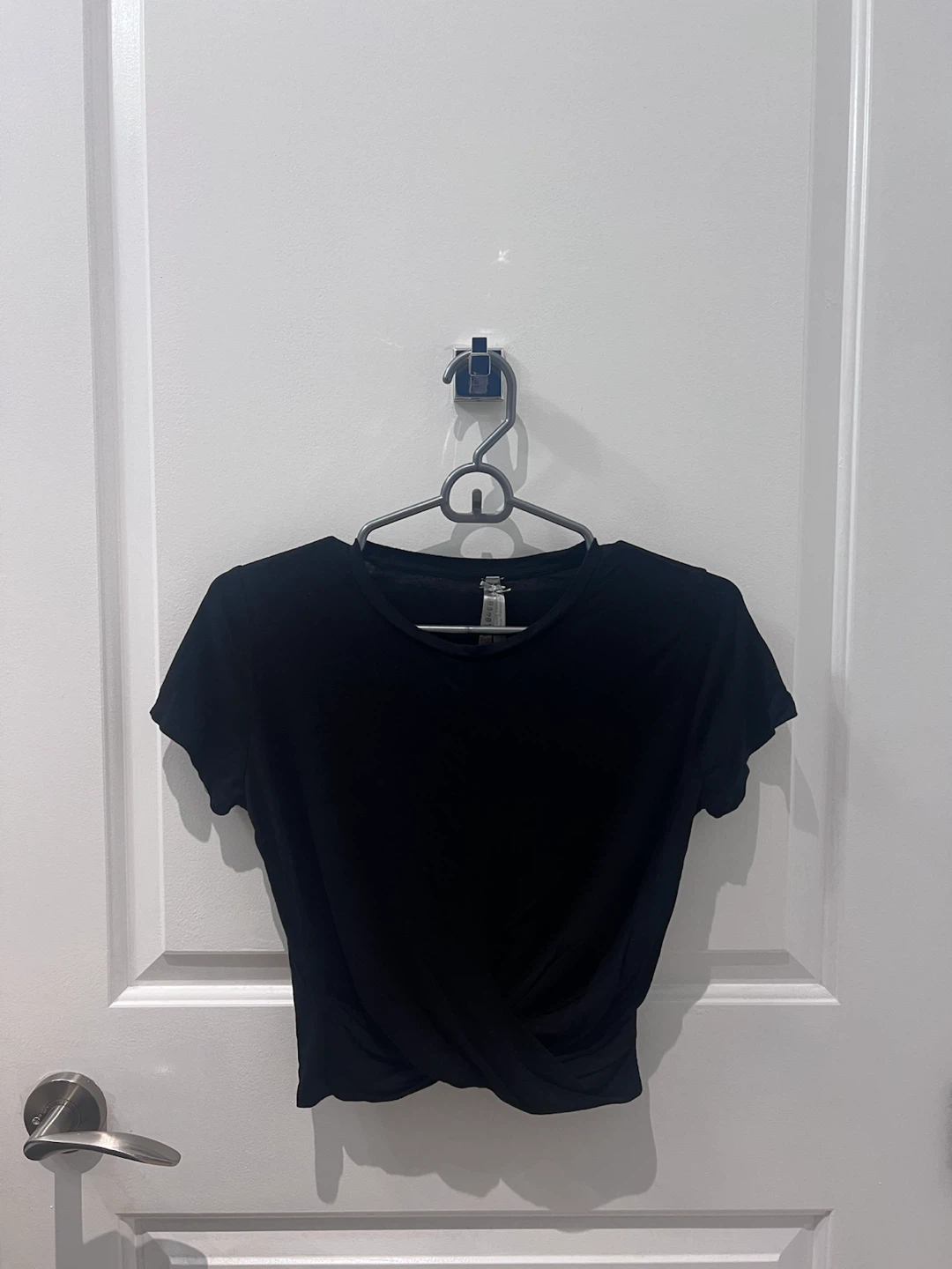 Black short sleeve twist-front top