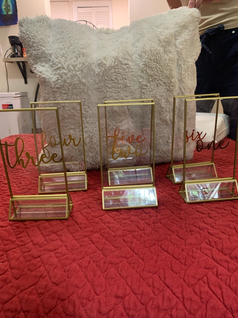 Set of 6 clear and gold plastic table numbers