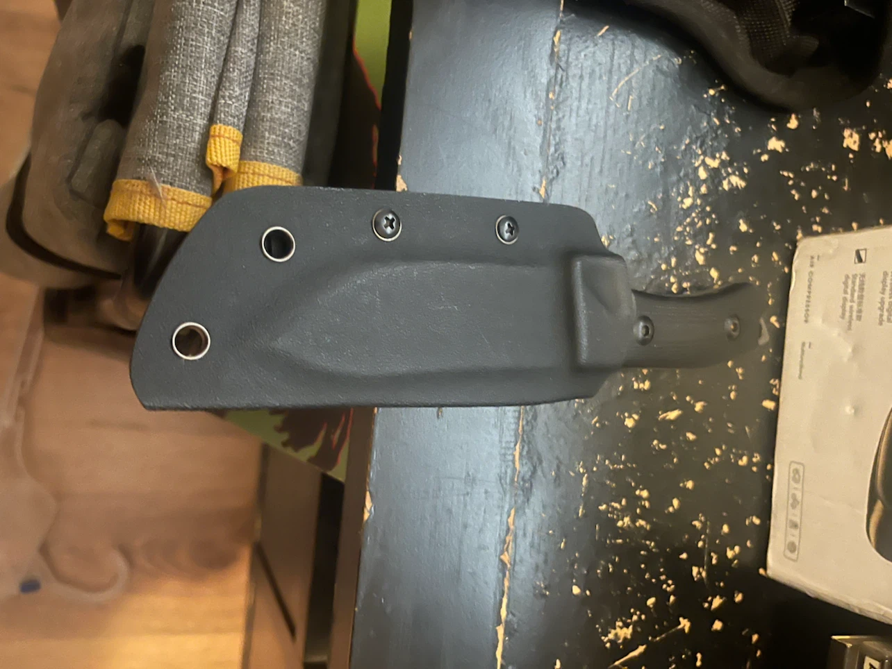 Black fixed blade knife with holster