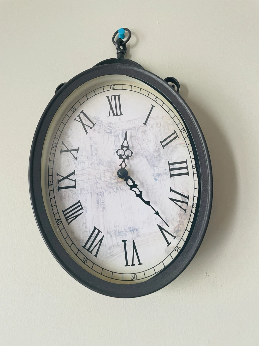 Oval Wall Clock with Roman Numerals