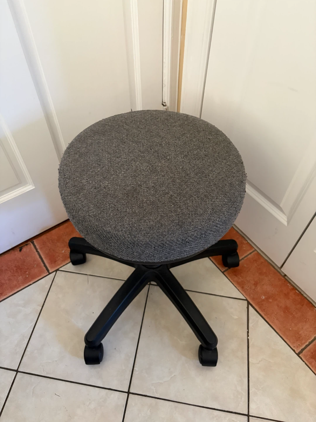Adjustable Gray Rolling Stool